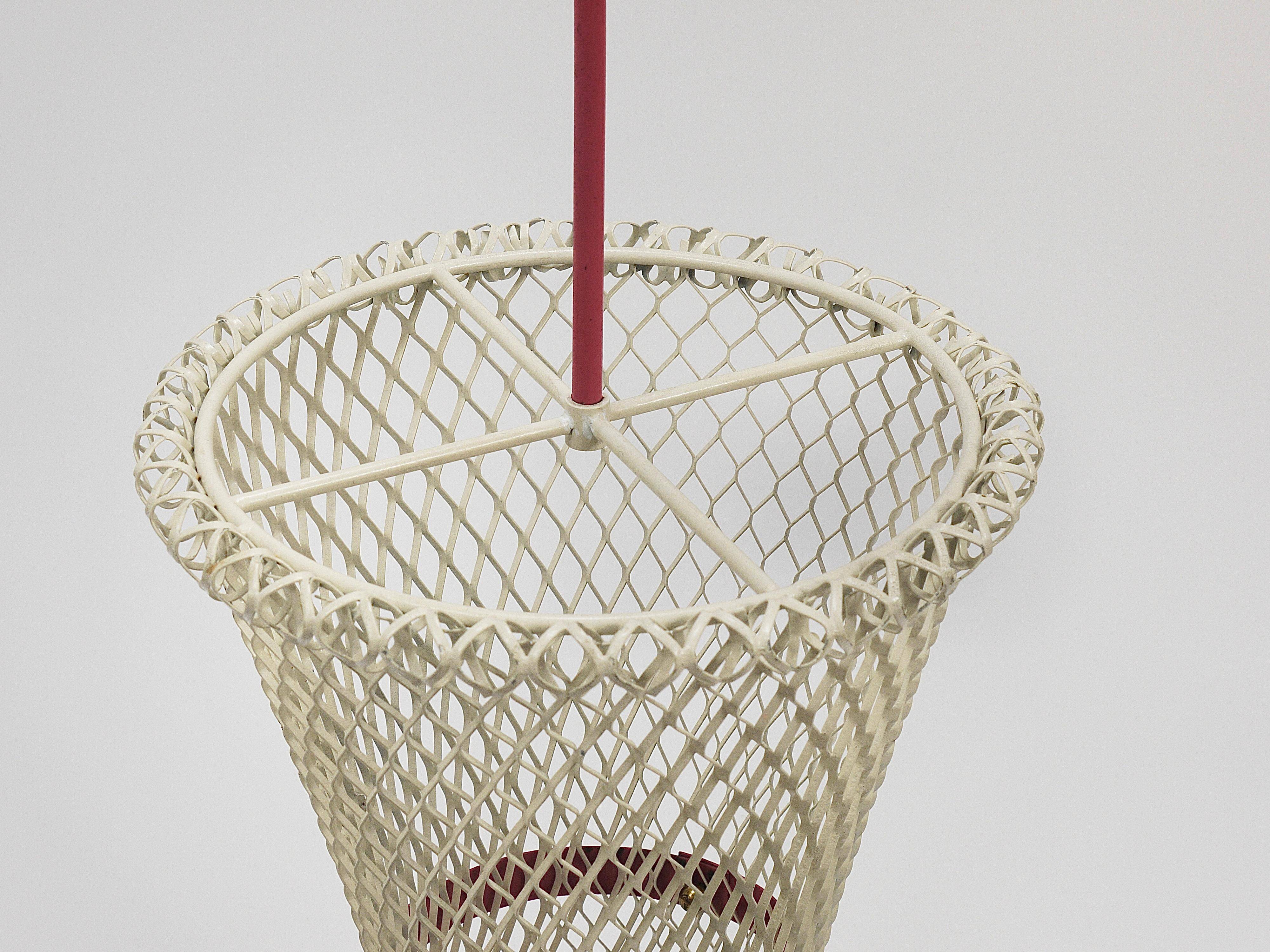 Bow tie umbrella stand in the style of Mathieu Matégot, mid-century, metal, France, 1950s.