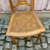 Vintage caned Louis XVI chair in solid gold wood.