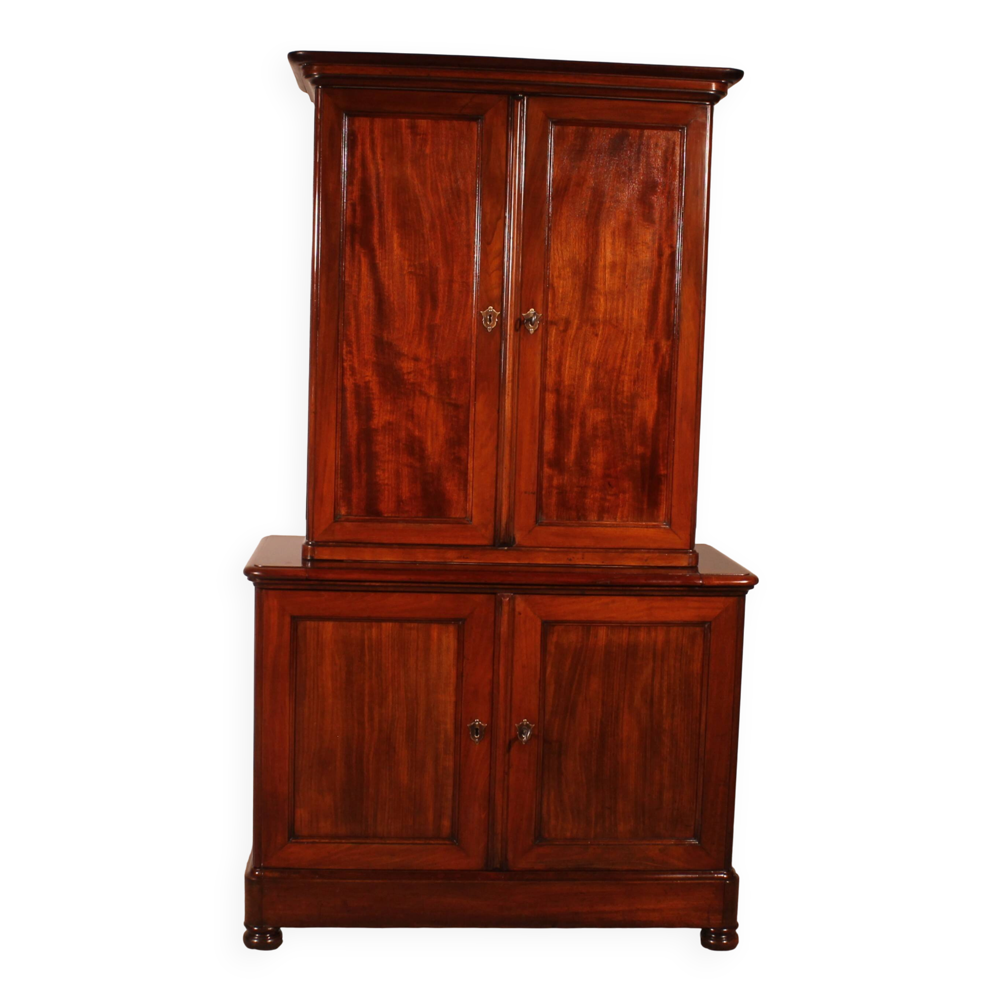 small two-body solid mahogany desk from the early 19th century with writing surface