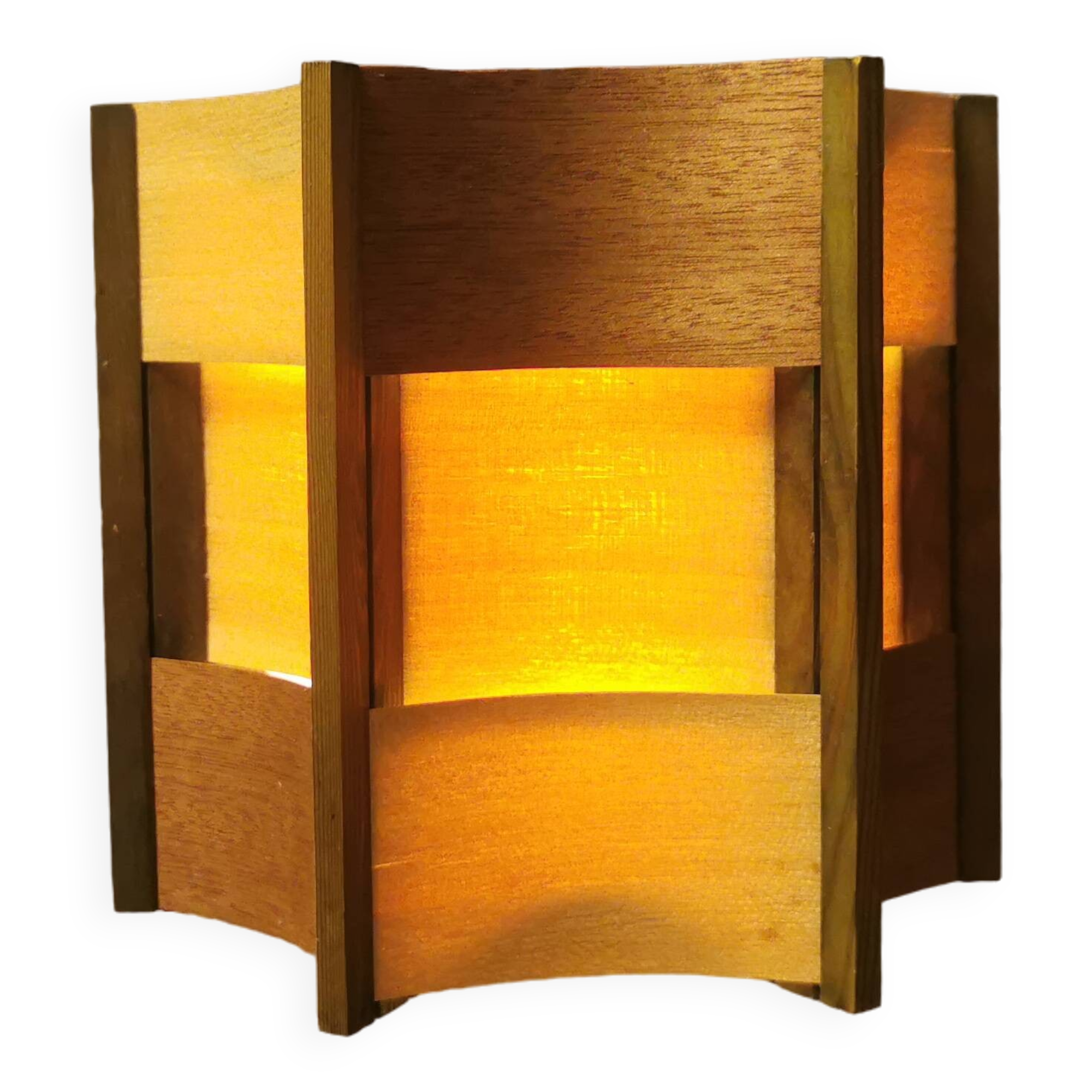 Older lamp in wood veneer, partially painted in green colour.