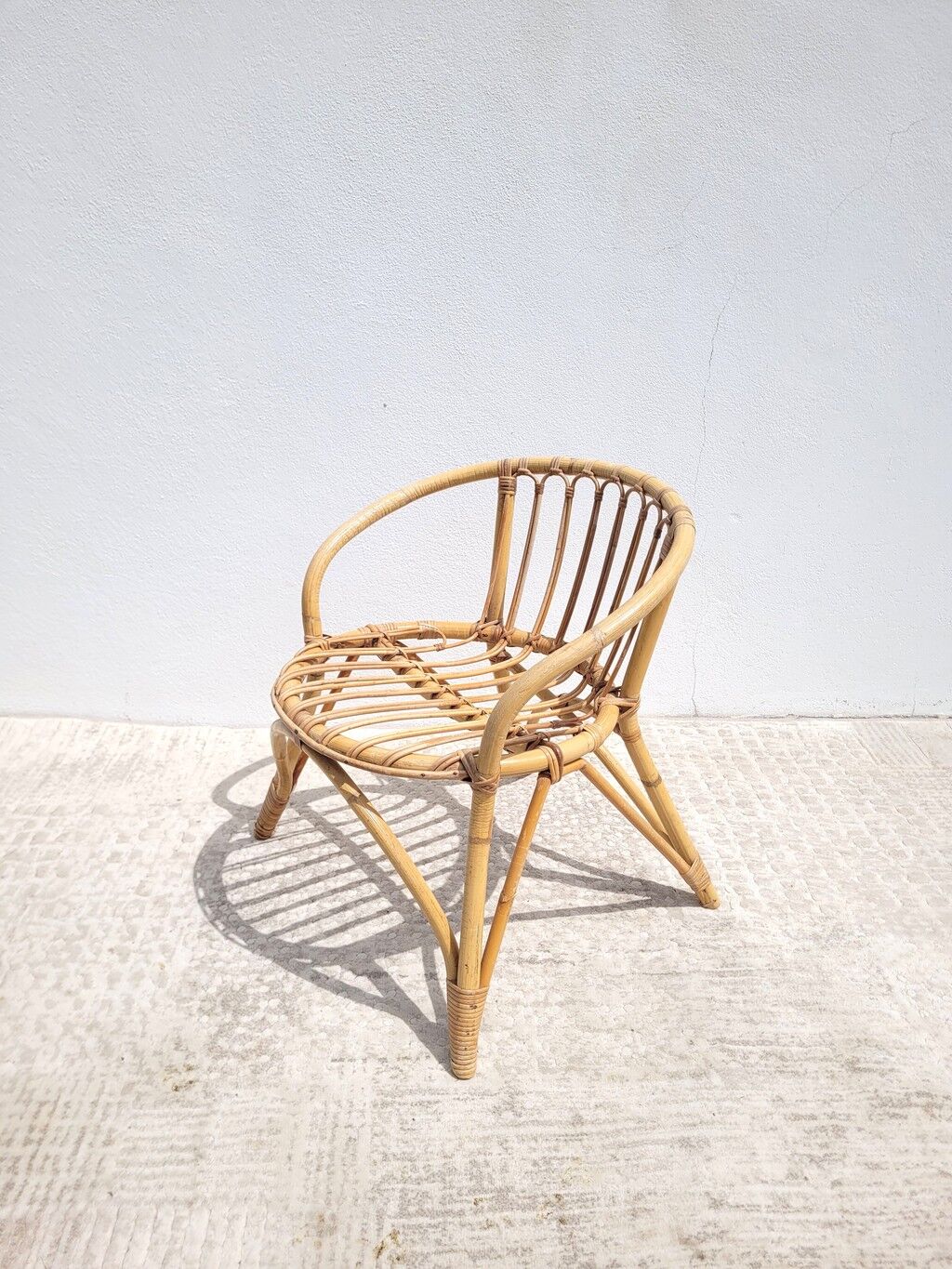 Small vintage rattan children's armchair
