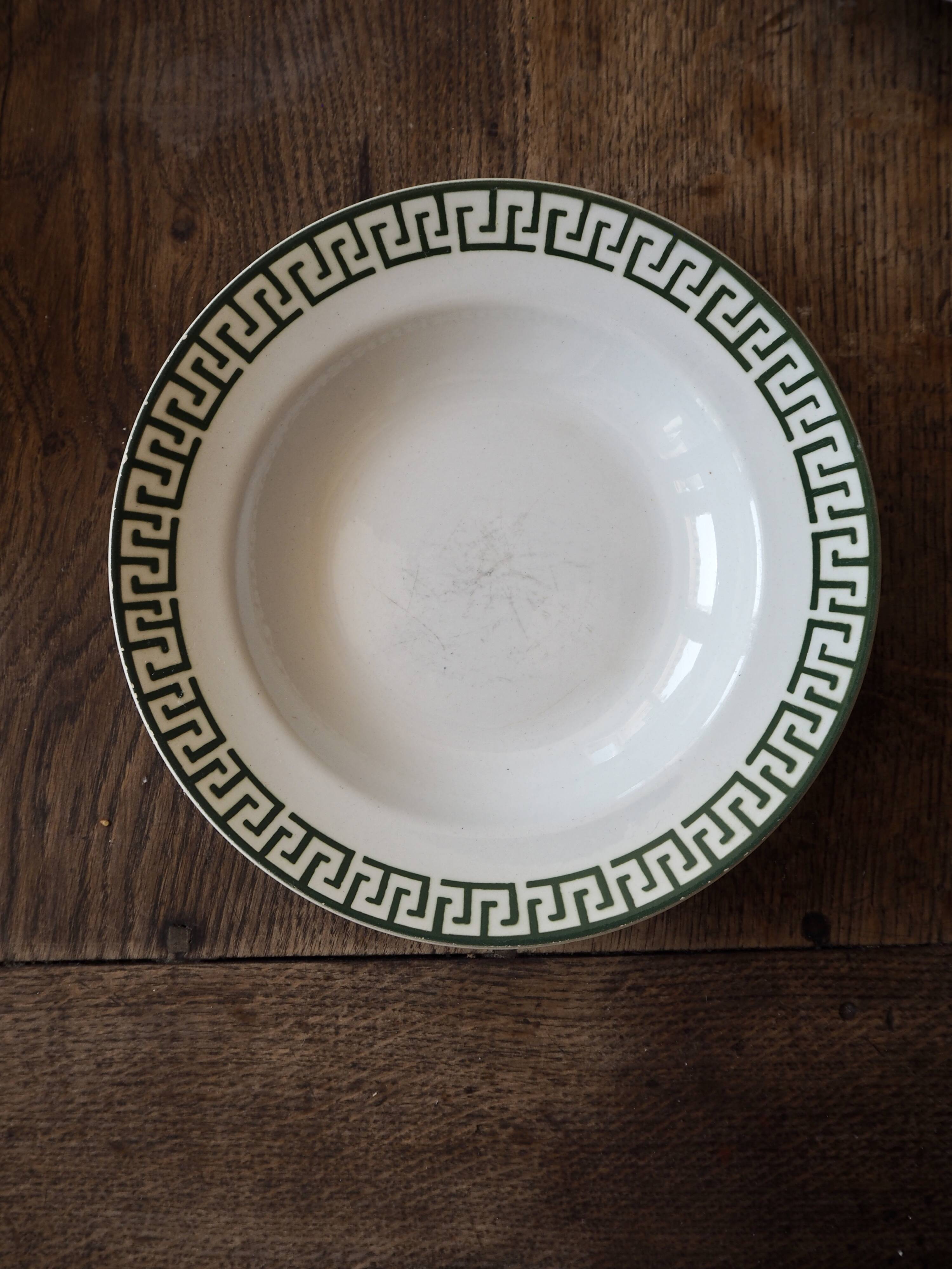 Set of 12 green patterned soup plates, Badonviller earthenware
