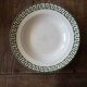 Set of 12 green patterned soup plates, Badonviller earthenware