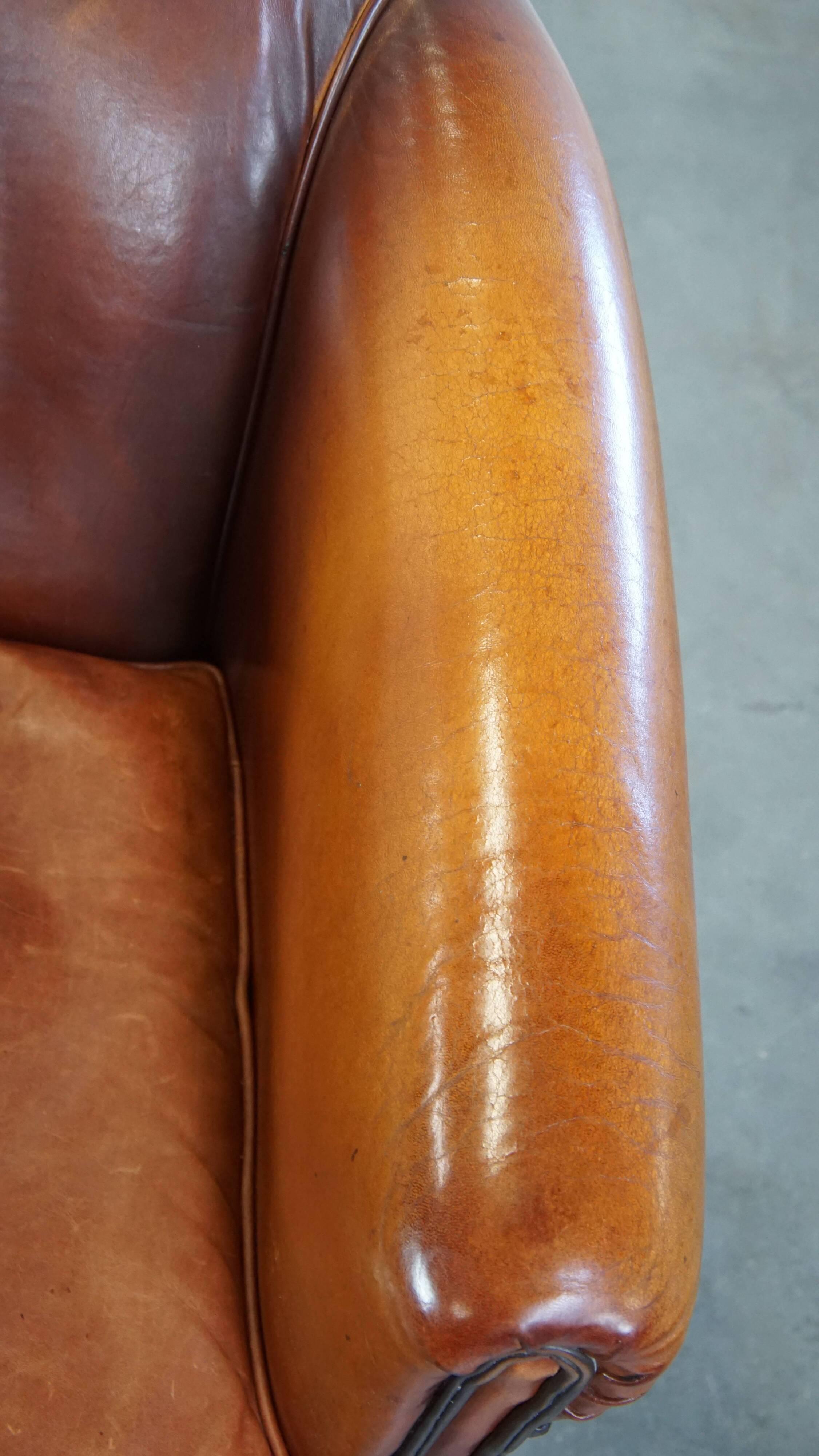 Correctly finished sheep leather club chair