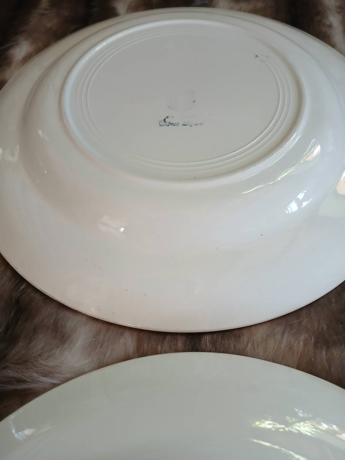 2 old round checkered plates