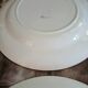 2 old round checkered plates