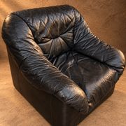Leather armchairs and matching pouf, Italy, circa 1980