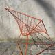 Orange lattice armchair