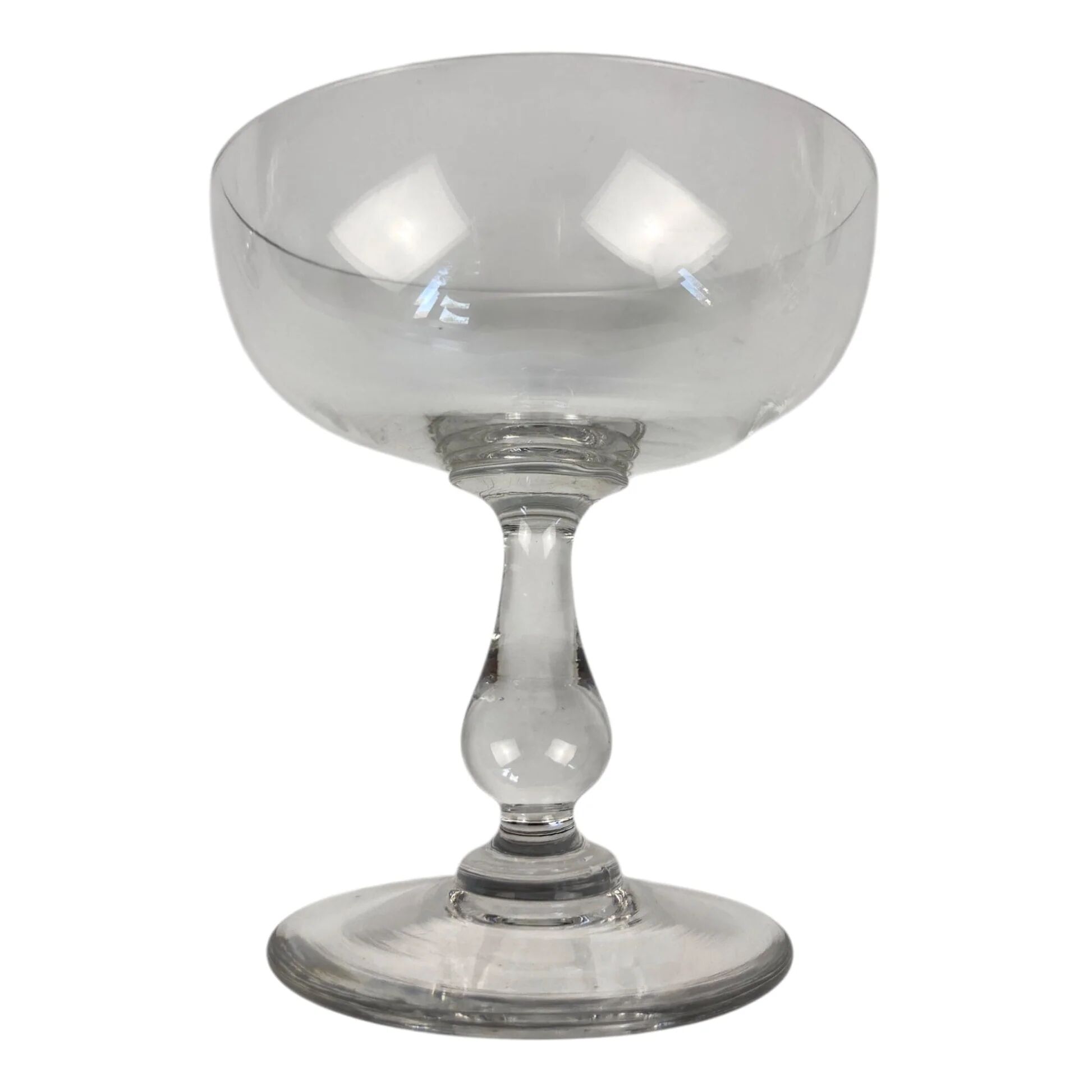 4 Baccarat crystal champagne coupes in a gondola shape.