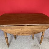 Cherry wood drop-leaf table.