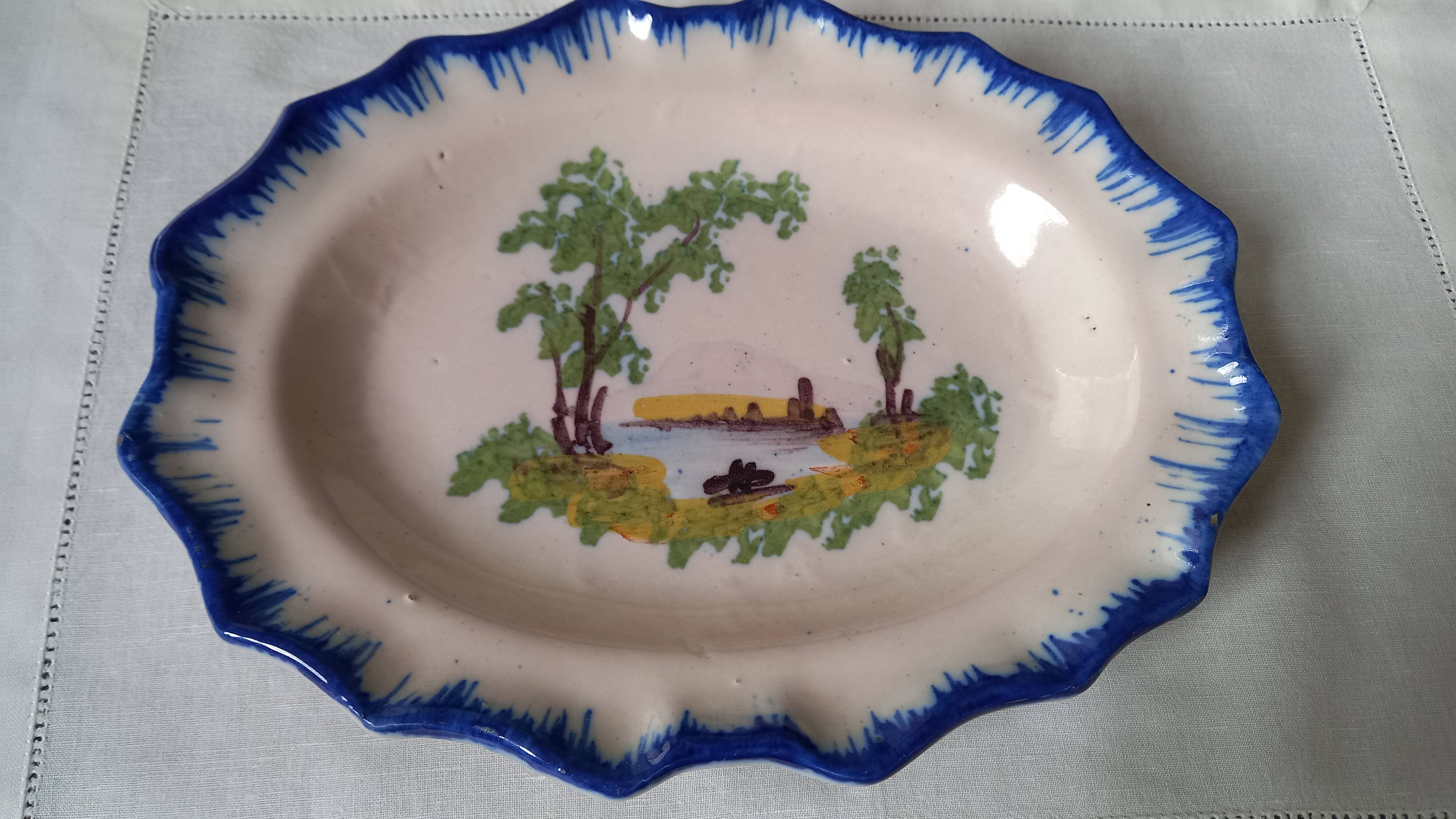 Oval dish with hand-painted decoration