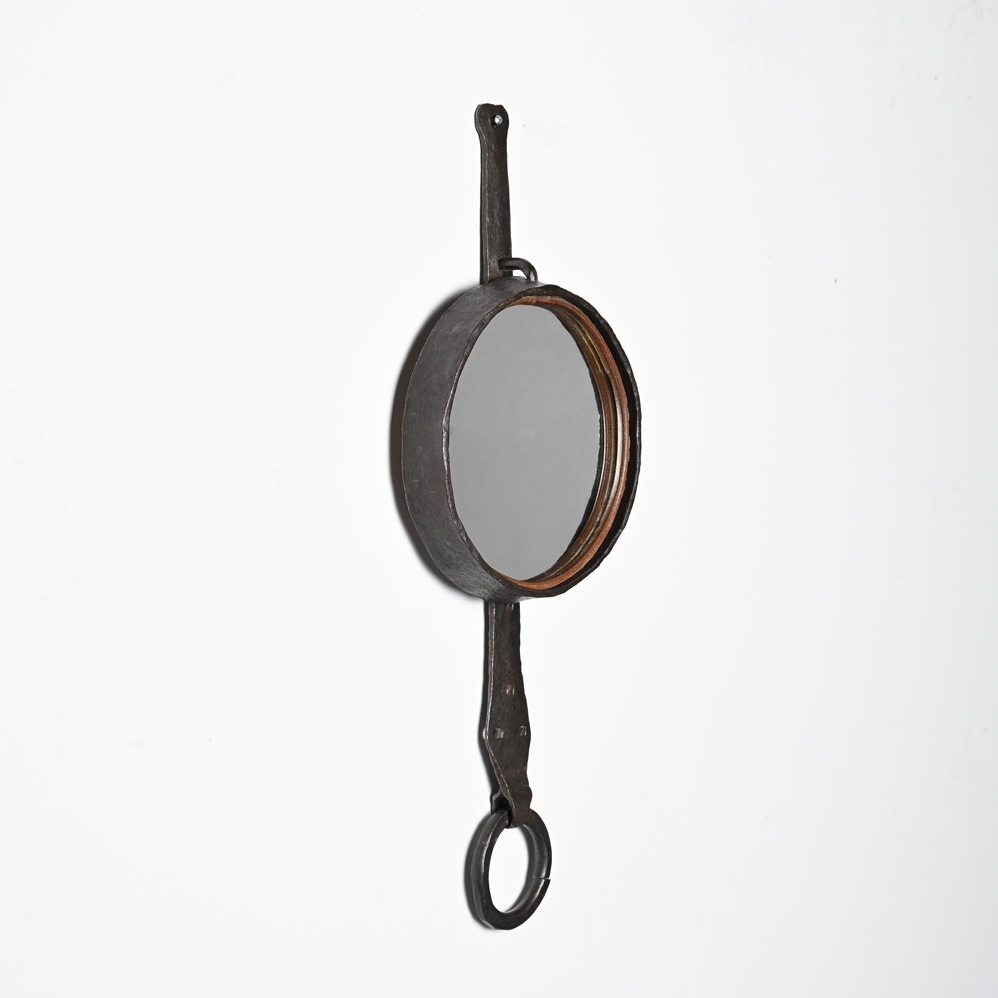 Wrought iron mirror by Léopold Gest, France, circa 1970.
