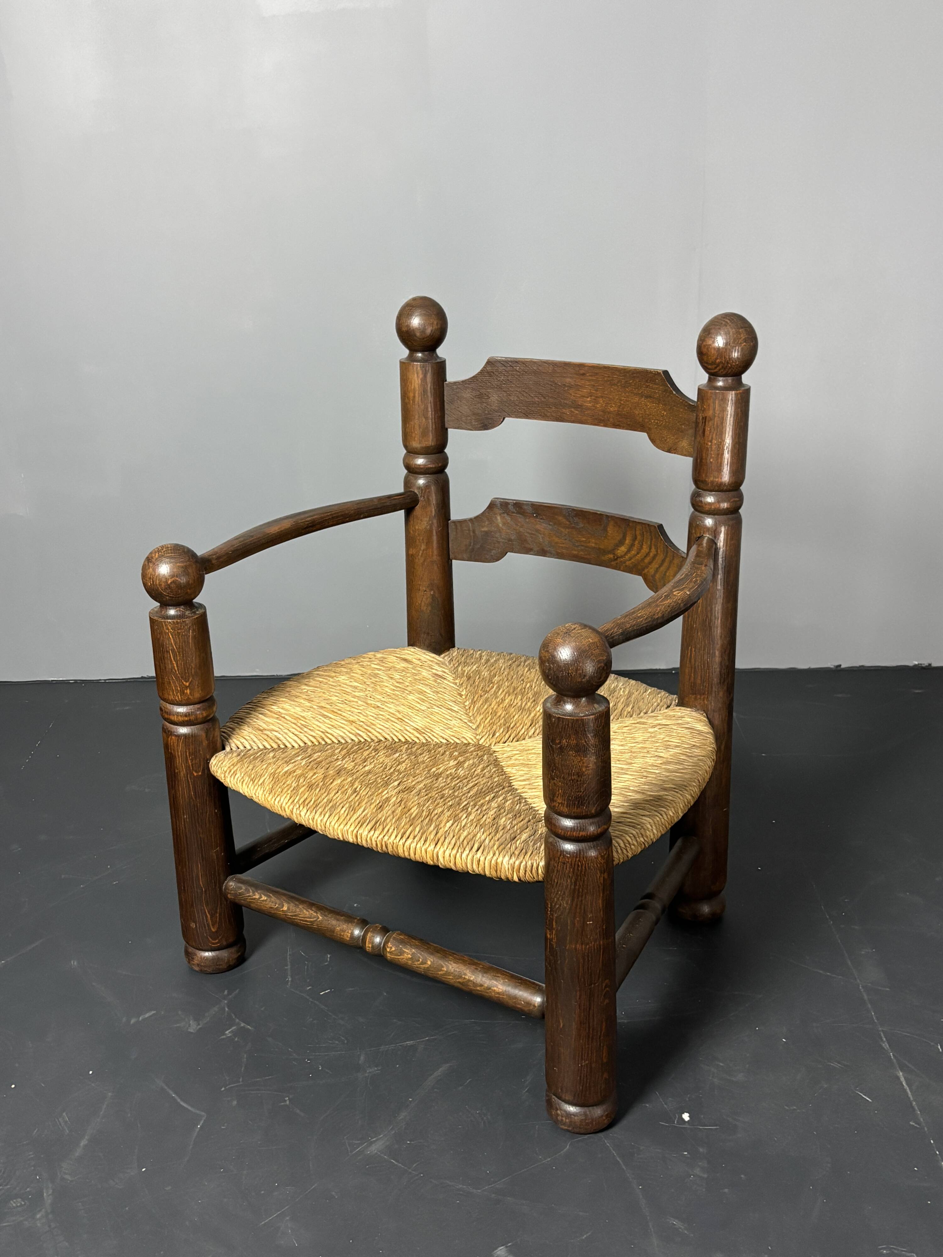 Brutalist French low rush oak side armchair by Charles Dudouyt ca 1940s