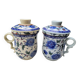 Paire de tasse à thé, couvercle et infuseur