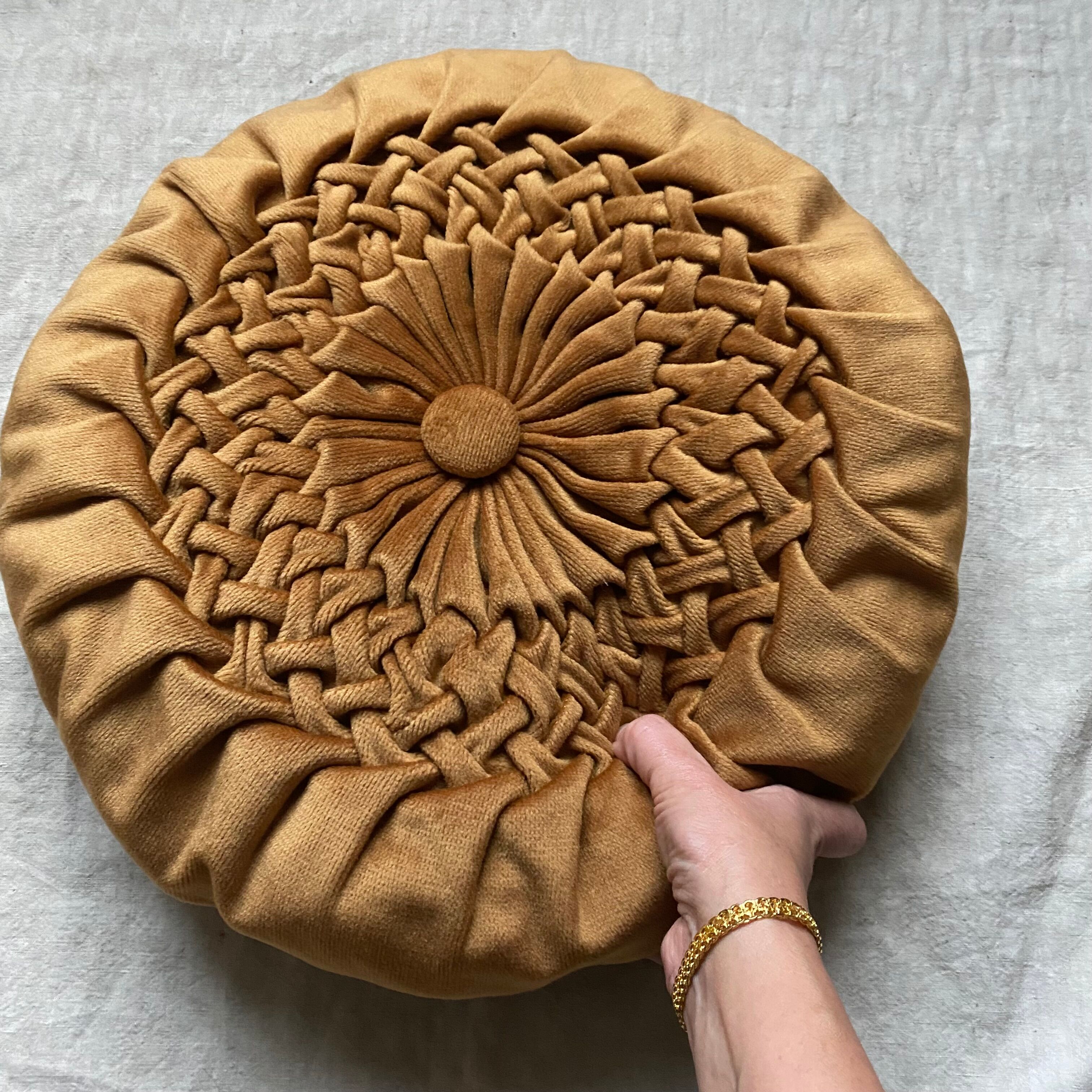 Vintage round cushion in pleated velvet