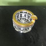 Glass ashtray and gold metal