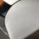 Set of two design chairs in steel and faux leather.