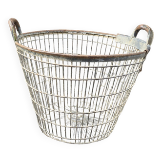 Old iron potato basket