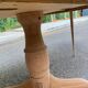 Large extendable round dining table stripped with a central wooden leg 110-198cm.