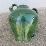 Antique glazed green terracotta oil jar, late 19th century.