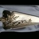 Golden metal pie shovel stamped Fabiora