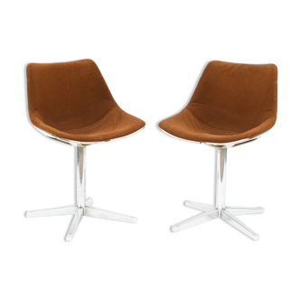 Pair of swivel chairs by Roland Schweitzer