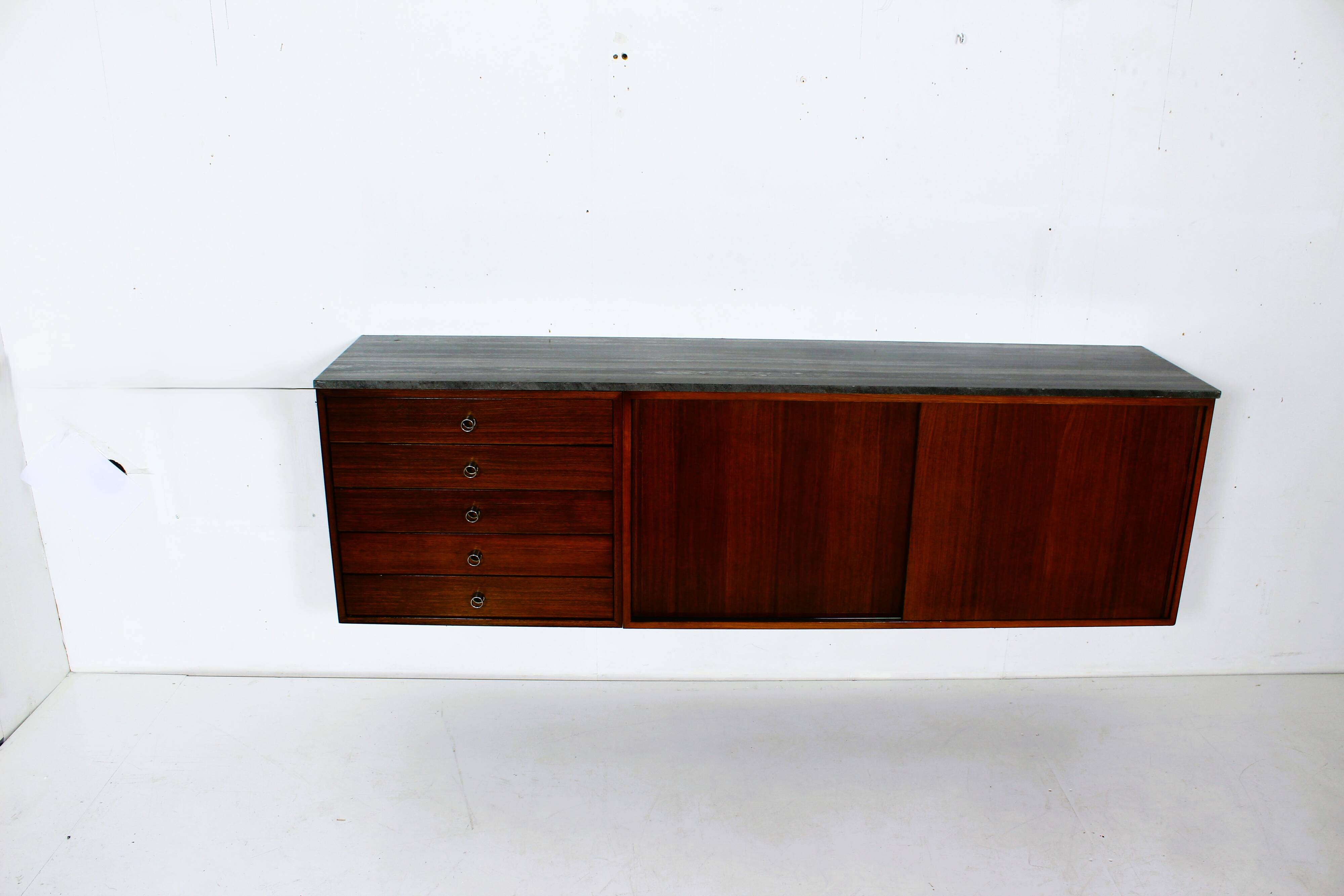 Suspended teak buffet from the 1970s.