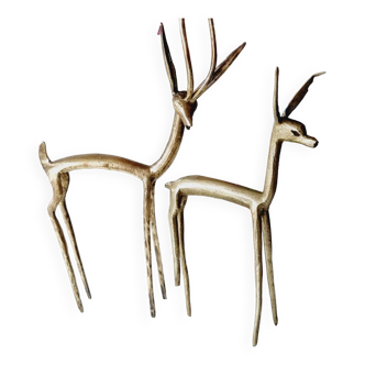 Coupled with stylized brass antelopes