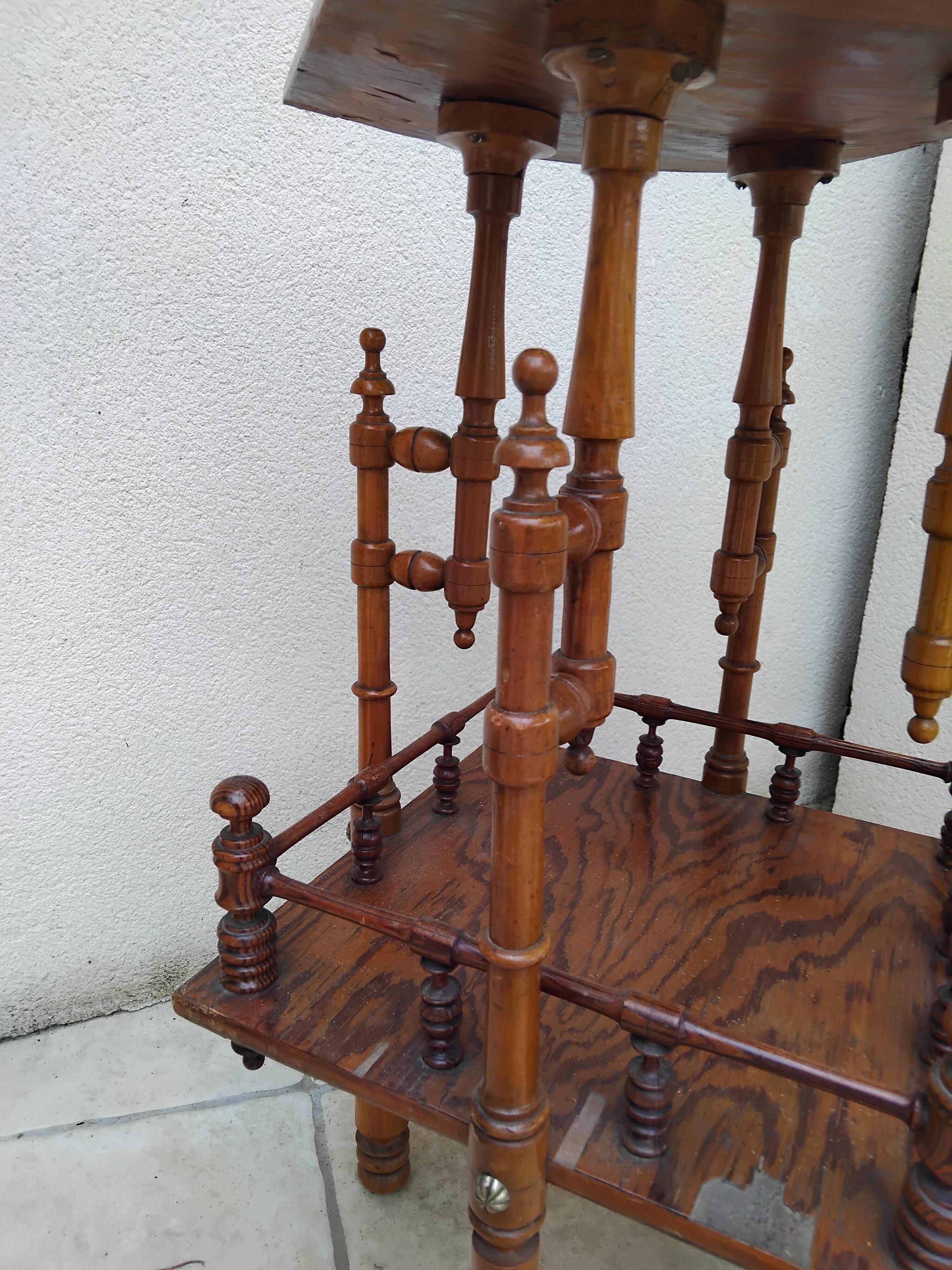 Antique pedestal table in Asian Japonese style.