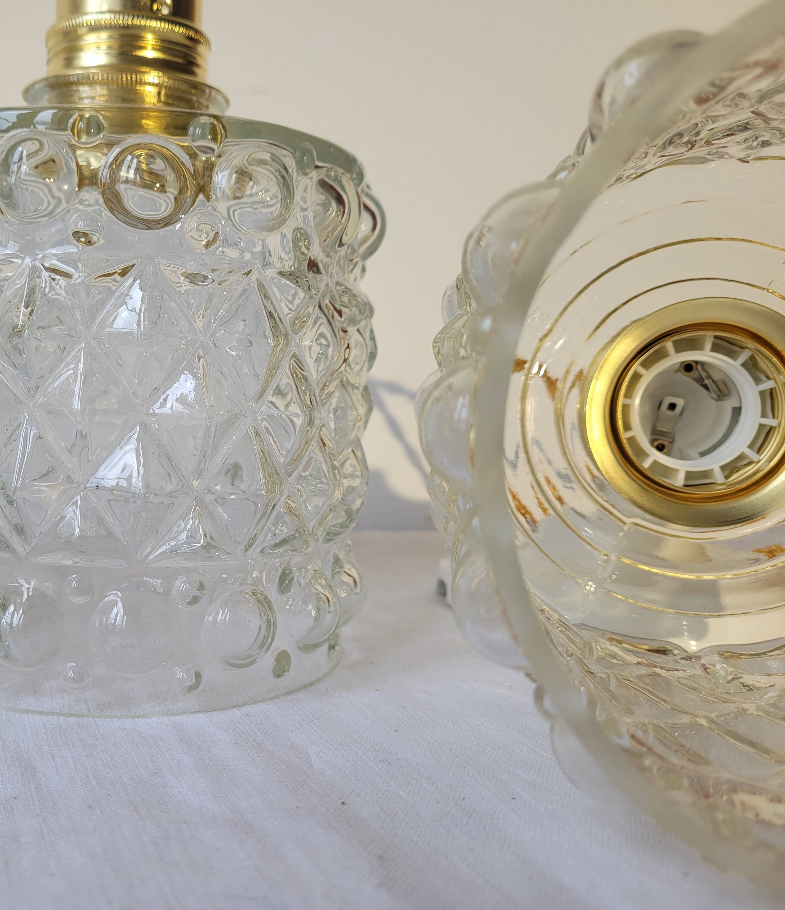 Trio of molded glass pendant lights
