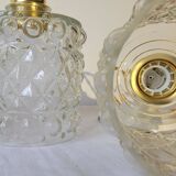 Trio of molded glass pendant lights