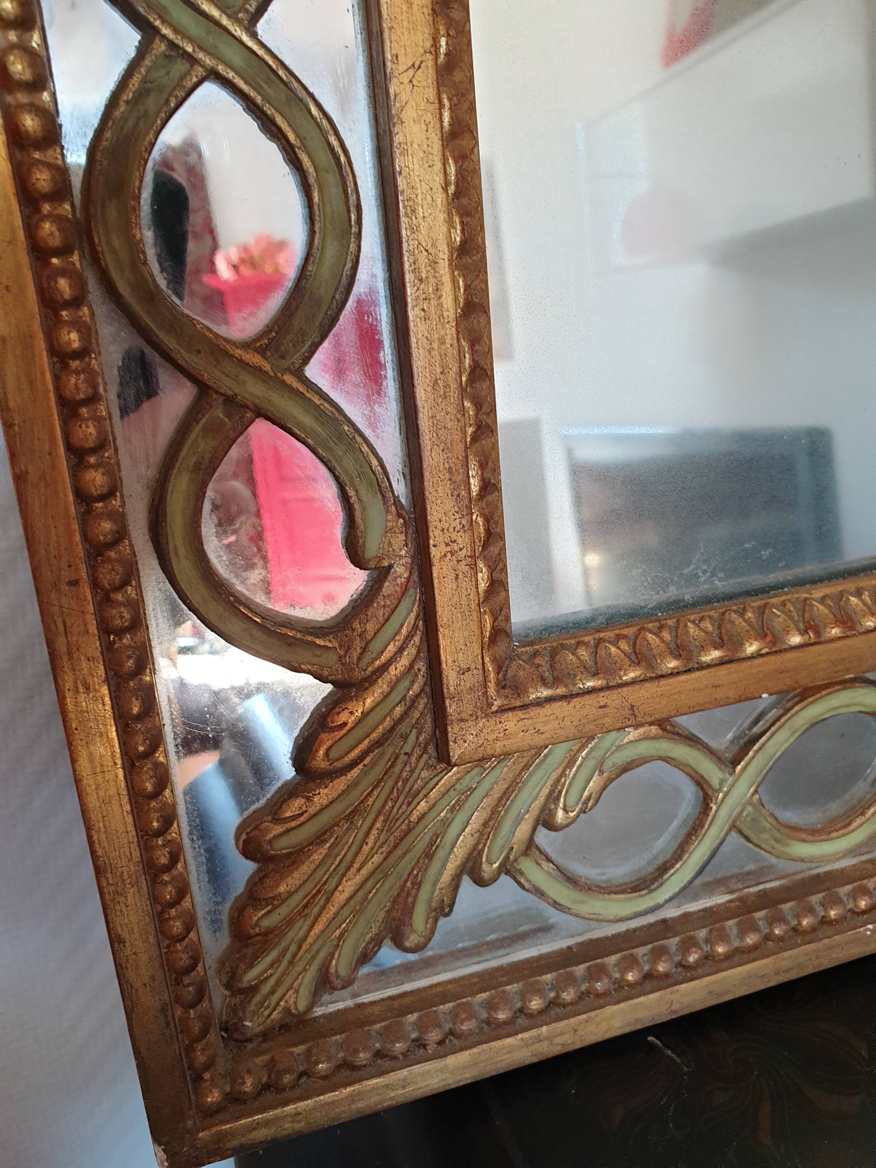 Classic antique mirror in gilded wood