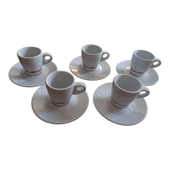 Set of coffee cups and under cups