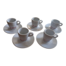 Set of coffee cups and under cups