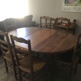 Dining room table with 3 extension cords and 6 chairs