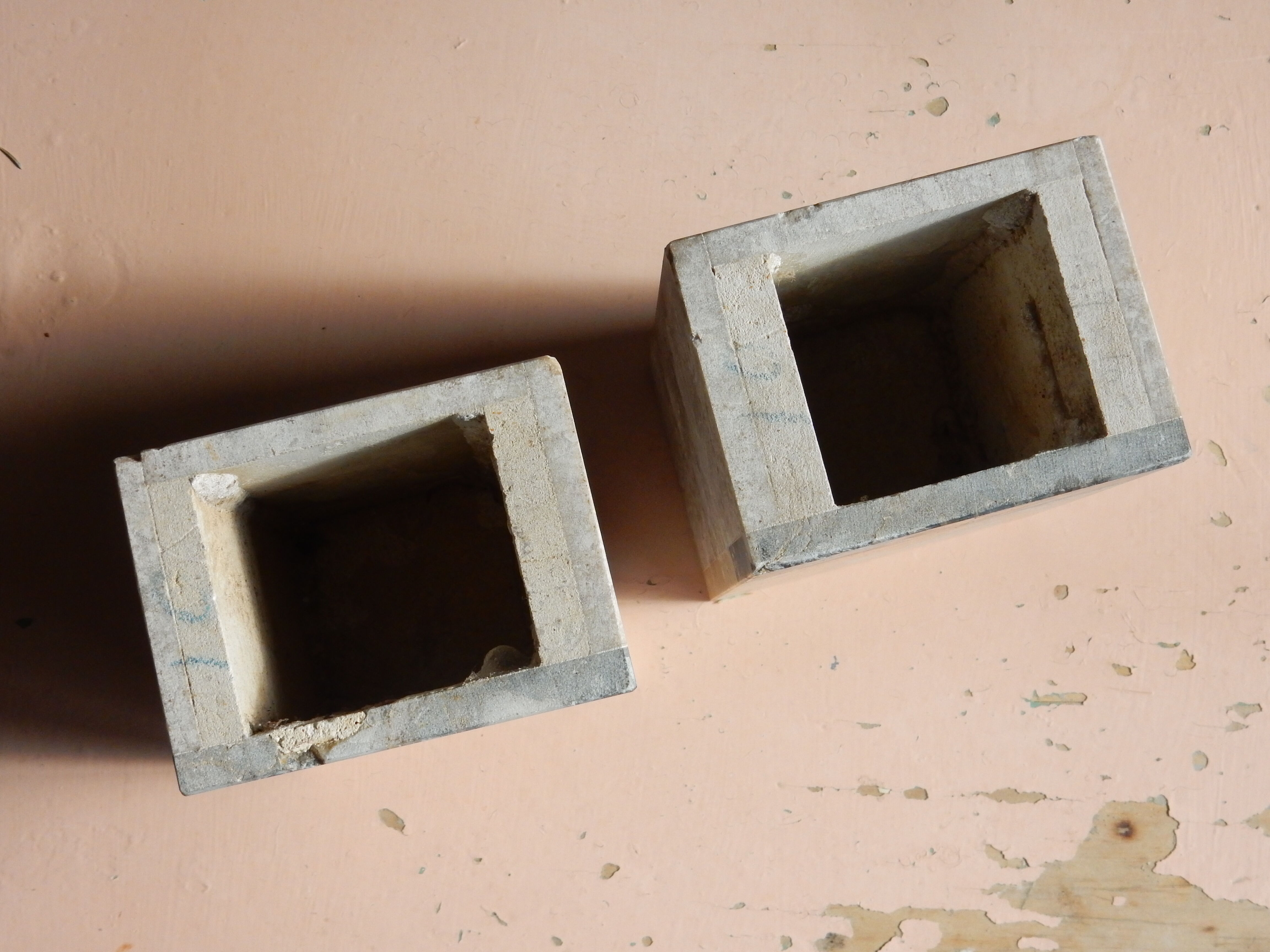 Pair of travertine and granite vases Art Deco
