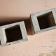 Pair of travertine and granite vases Art Deco