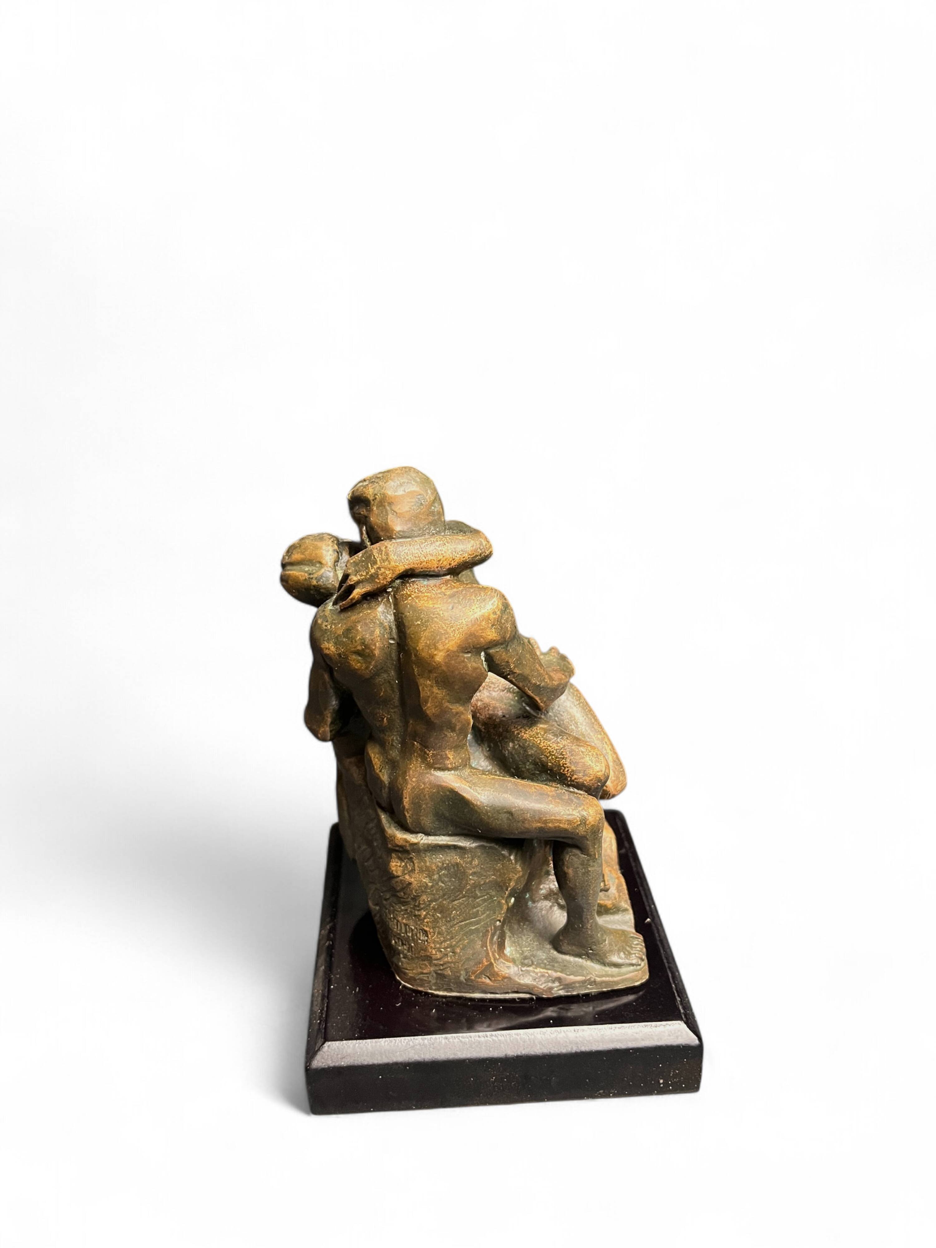 Rodin (d’après), reproduction en bronze Le Baiser XXème