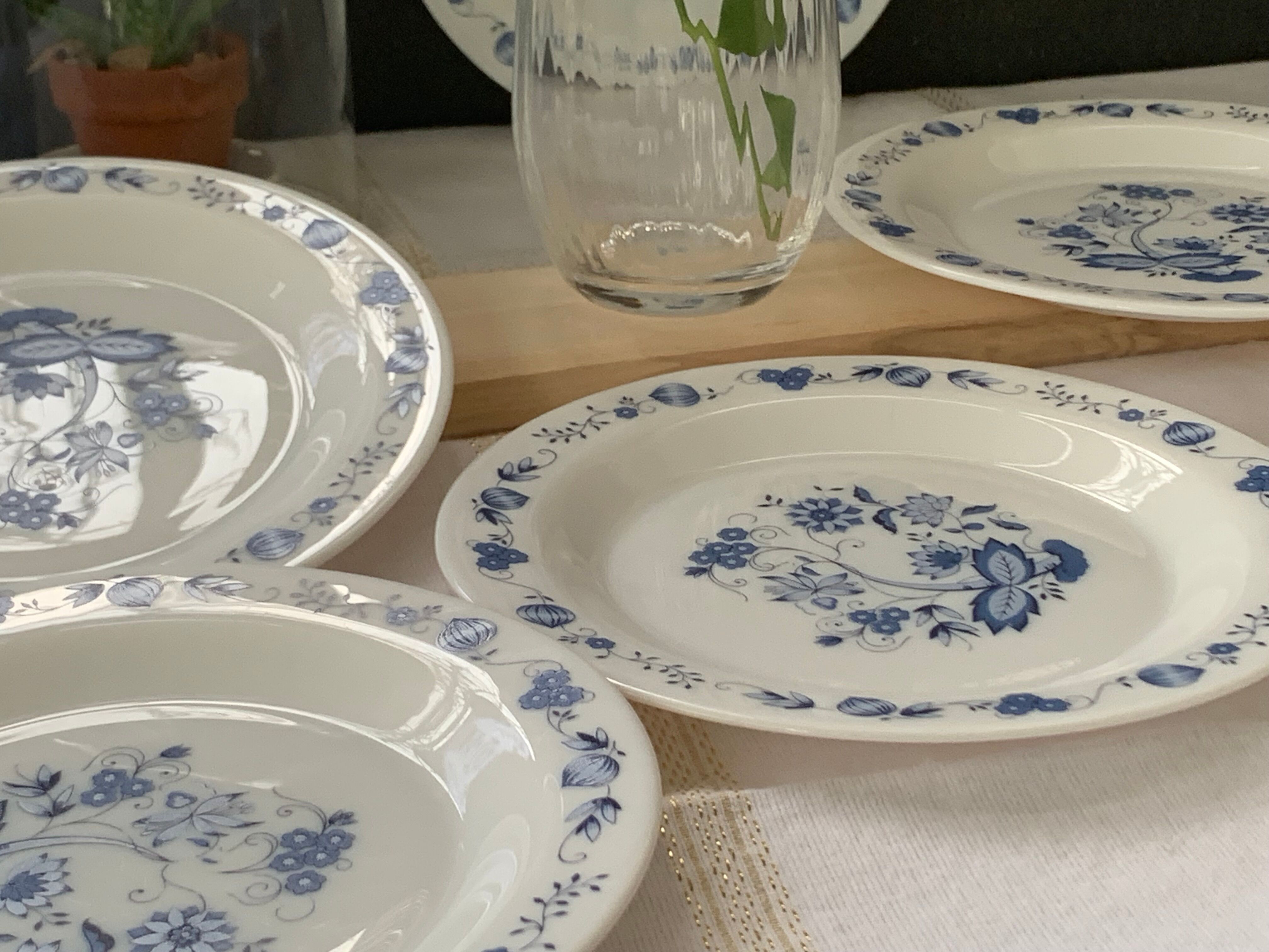 3 bowls and 5 blue plates