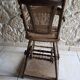 Chaise haute cannée transformable en bois