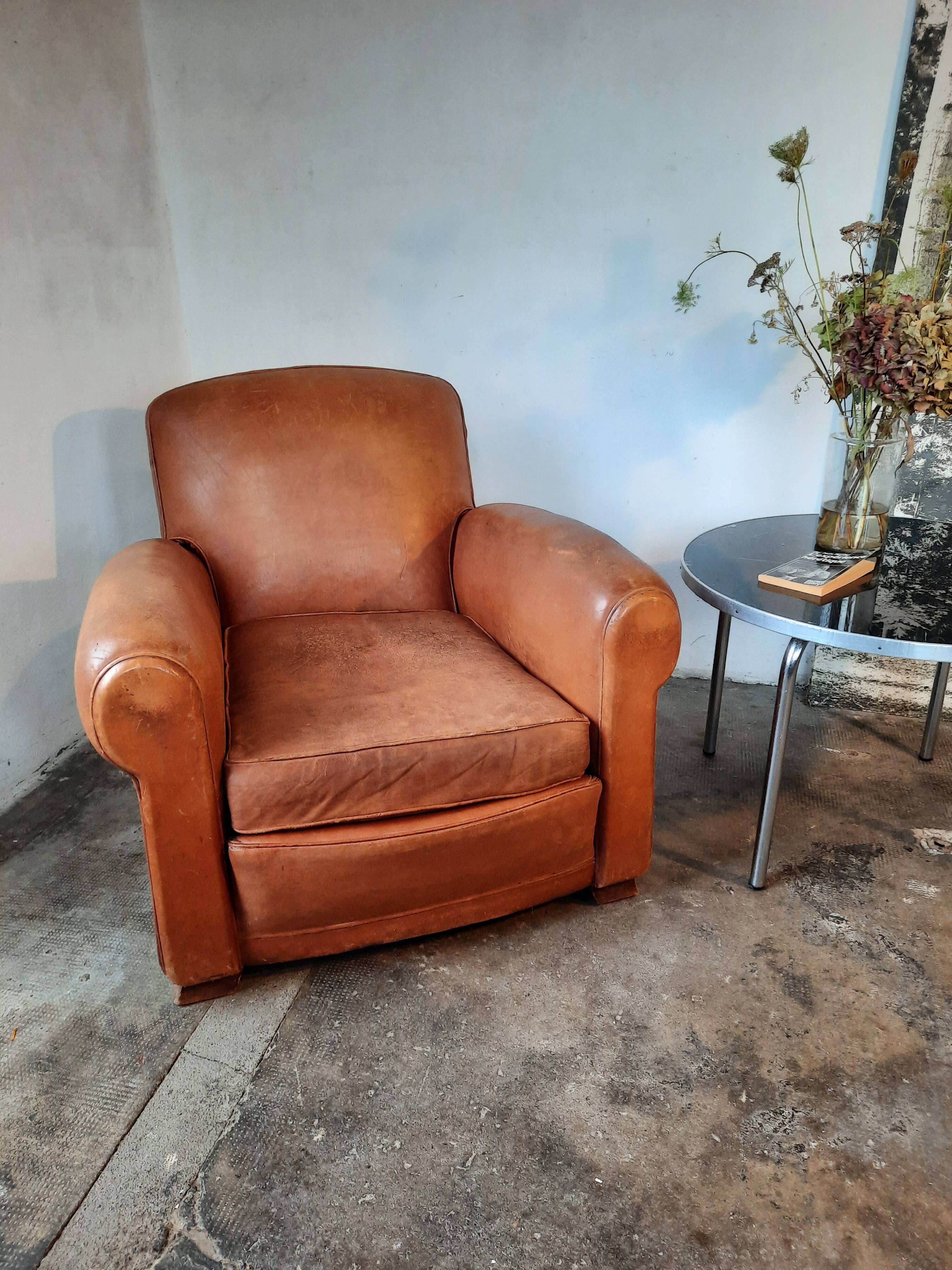 Old leather club chair 1940-1950
