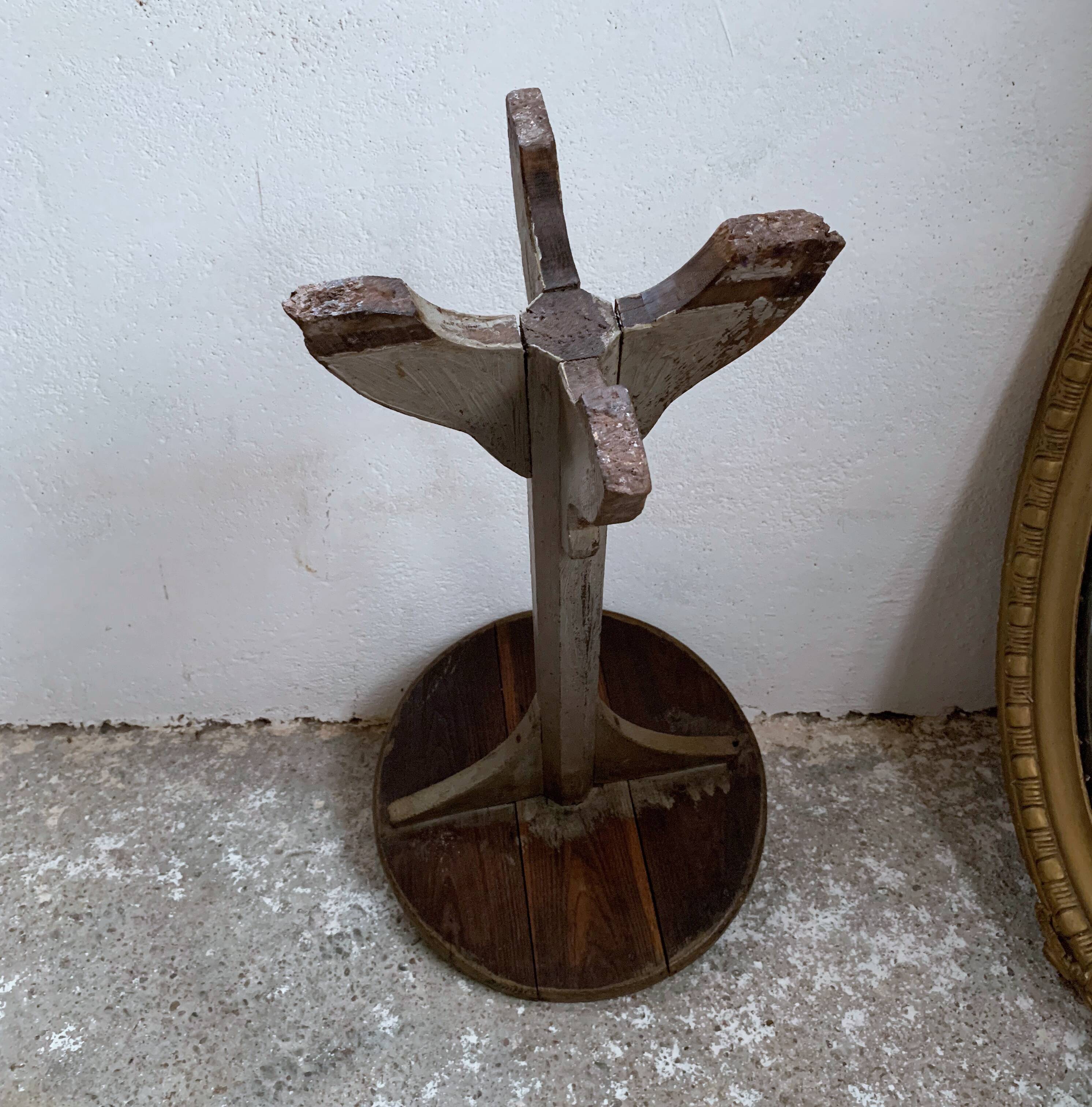 wooden pedestal or primitive winemaker's table