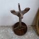 wooden pedestal or primitive winemaker's table