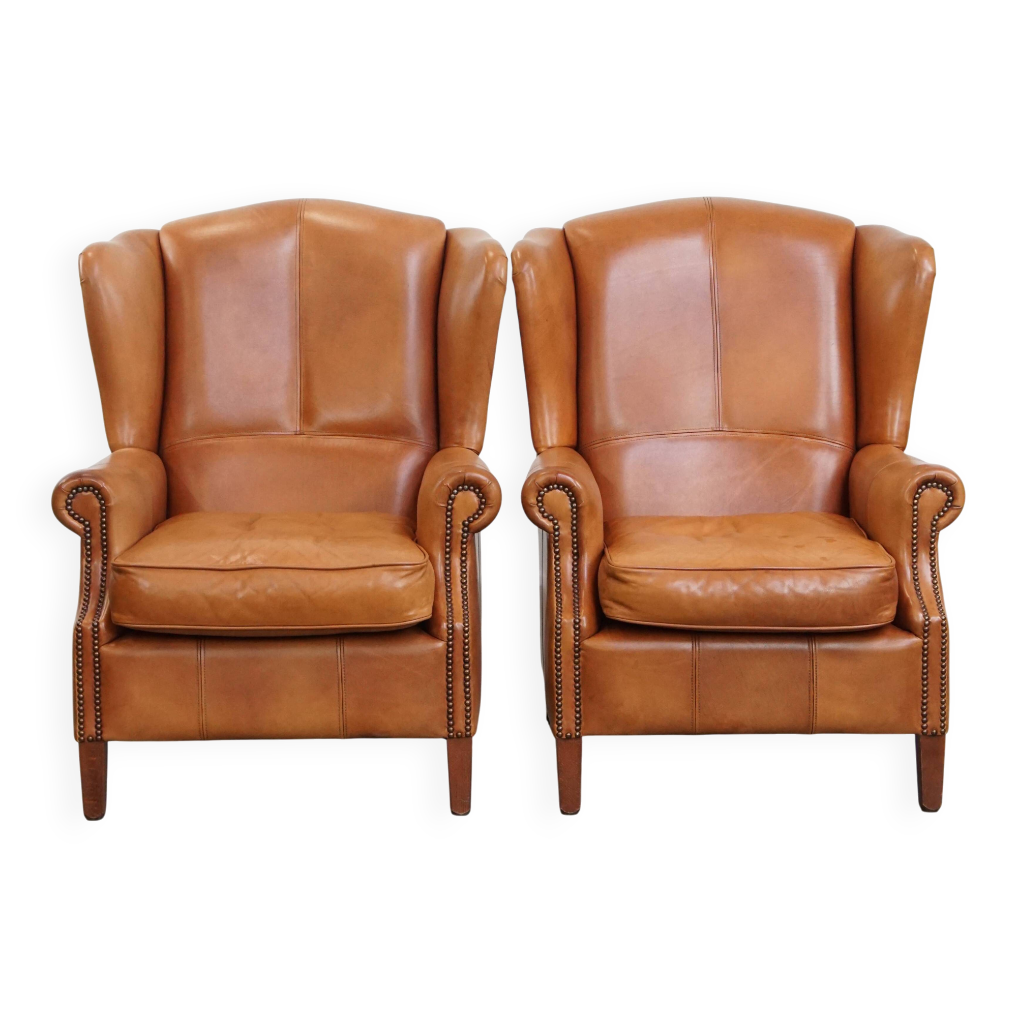 Set of 2 leather wingback chairs