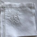 Set of six embroidered linen tea towels