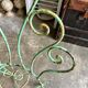 Chaise de jardin en fer forgé vert