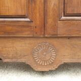 Walnut glazed bookcase with nineteenth century rose window