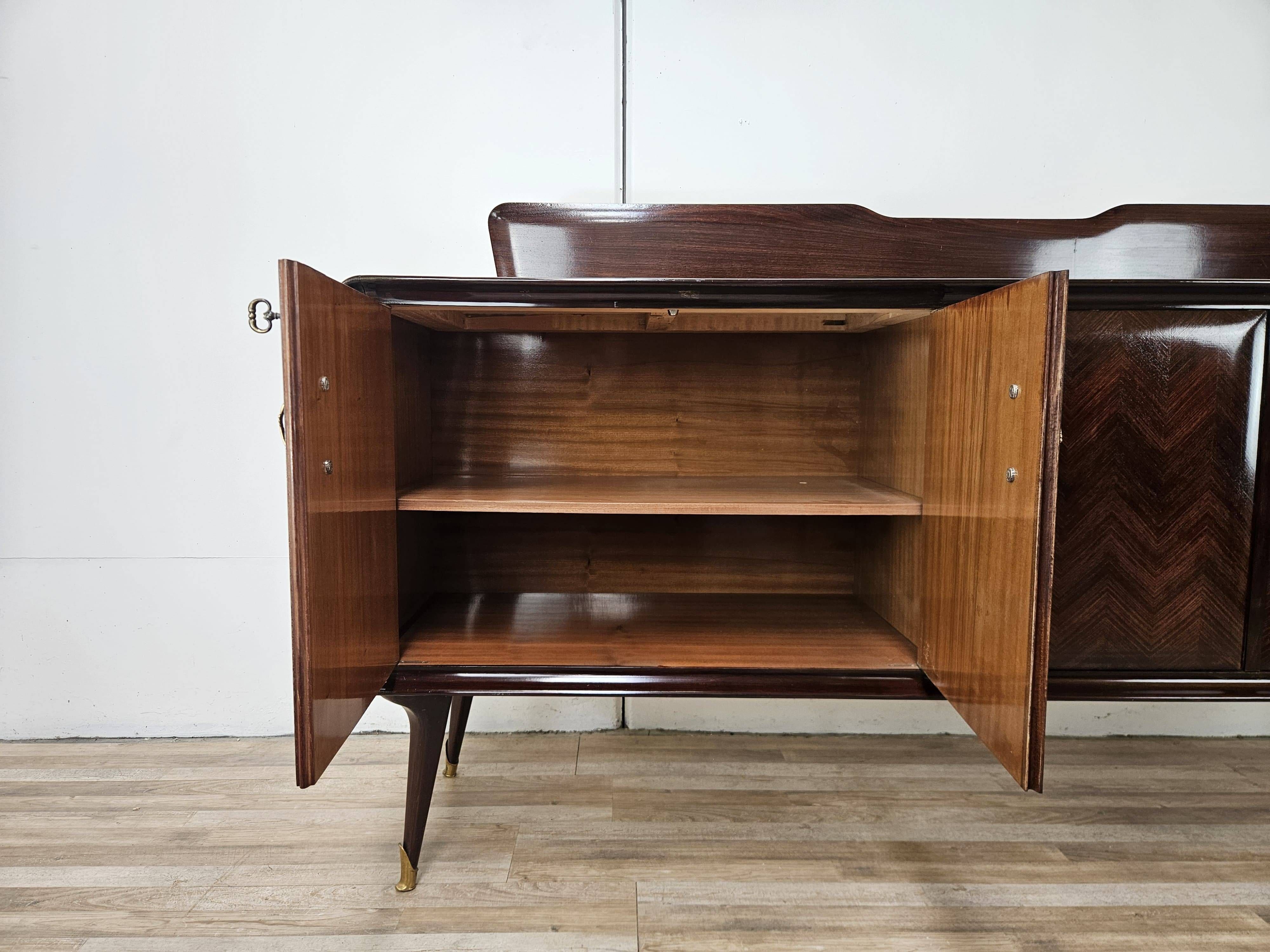 Mahogany sideboard with a glass top, 1960