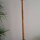 Coat rack on wood and black stand