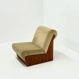 Vintage mid-century beige armchair with wooden frame and ottoman